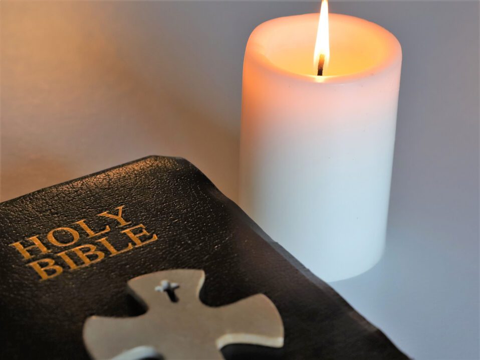 Holy Bible with Candle